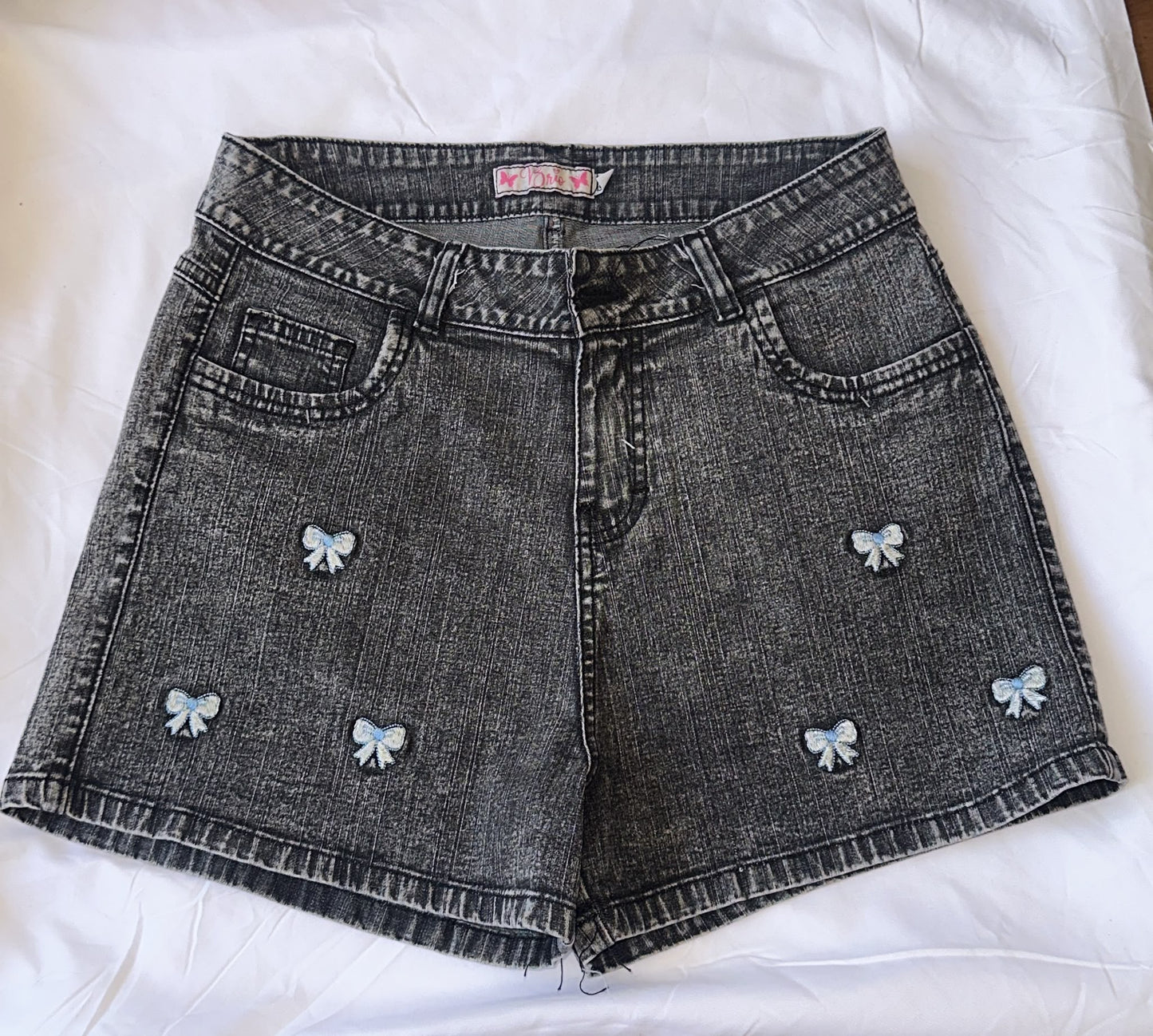 Pantalón corto vaquero gris con lazos